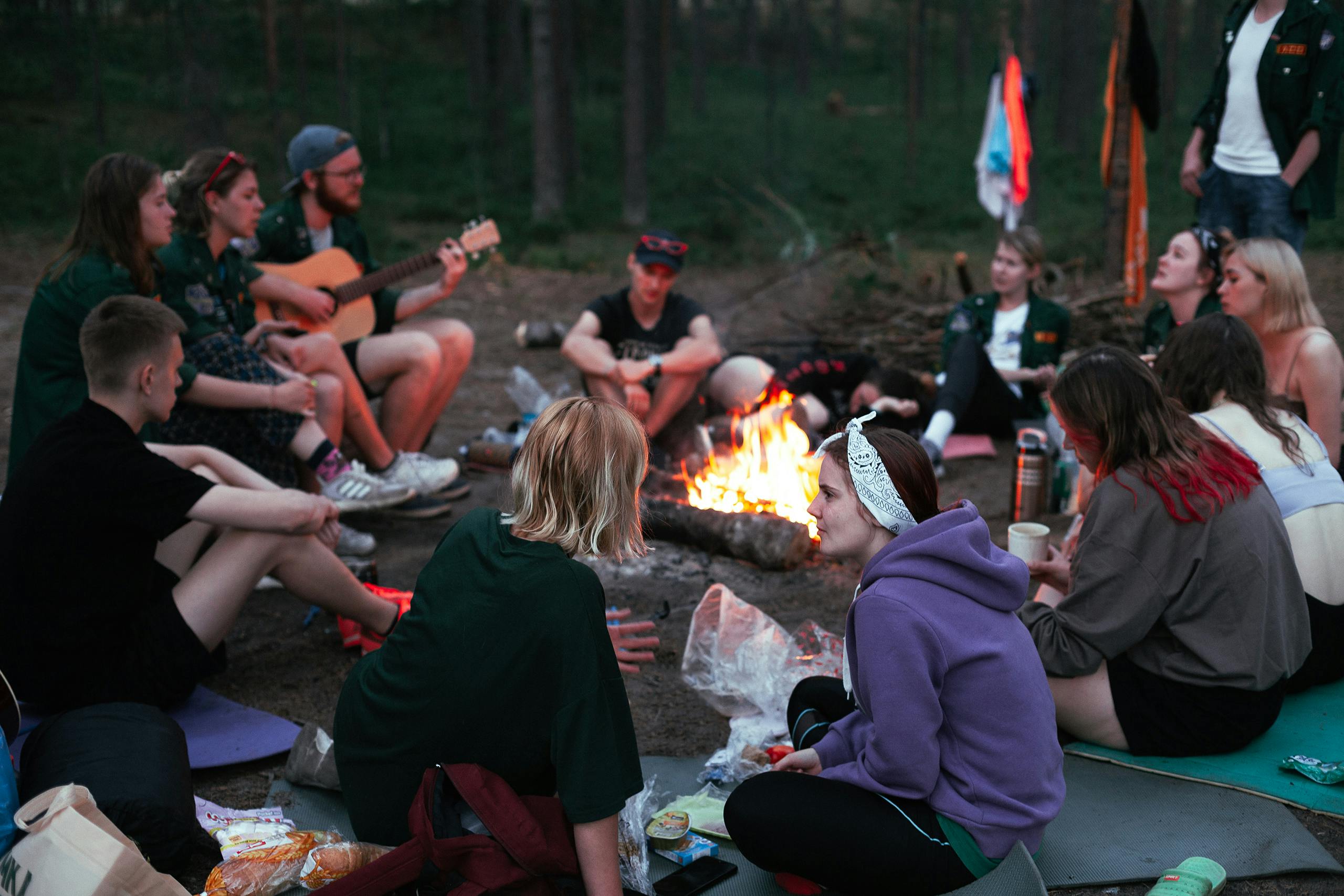 A group of friends enjoying a camp fire