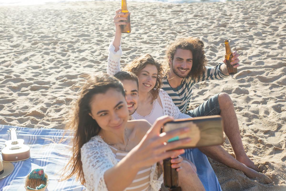 Couples Taking a Groupfie at the Beach